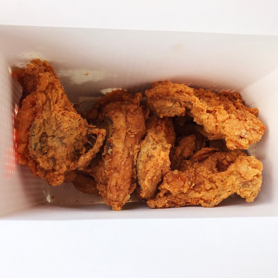 Printed menu for fried chicken and sandwiches.